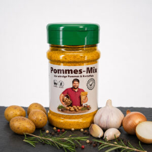 Pommes‑Mix Gewürzdose mit Kartoffeln, Knoblauch, Zwiebeln, Rosmarin und Pfefferkörnern auf dunkler Fläche.