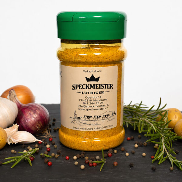 Speckmeister Luthiger Gewürzmischung – 250g vielseitige Würze für Küche & Grill Speckmeister Luthiger Gewürzdose mit grünem Deckel auf dunkler Fläche, umgeben von Kartoffeln, Knoblauch, Zwiebeln, Rosmarin und Pfefferkörnern.